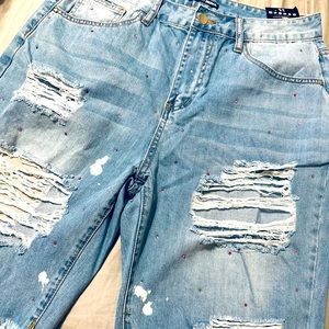 Brand new size11 Fashionnova denim shorts I bejeweled in a tri color pink stone.